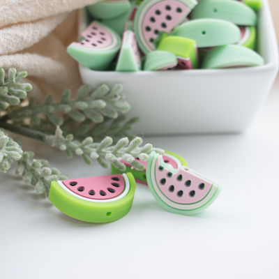 品質  Red Watermelon Shaped Silicone Beads Soft For Baby Teething 工場