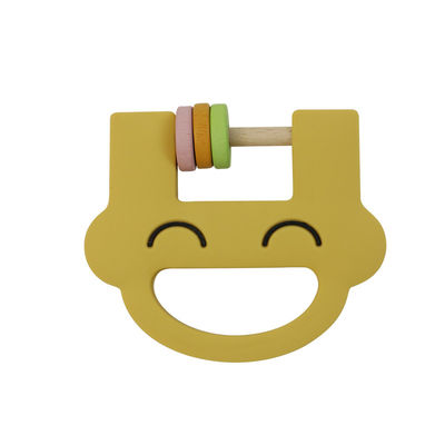 微笑の表面かわいいシリコーンの子供のおもちゃのシリコーンのラッセル音おしゃぶりはとのロゴOEM ODMをカスタマイズする