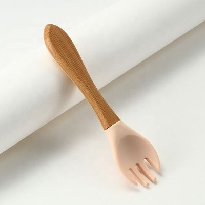 木のハンドルと耐熱性シリコーンのフォークおよびスプーンを食品等級
