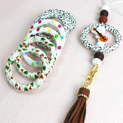 100%の安全なシリコーンのビード低いMOQはDIYの技術のkeychainの作成のためのパターンOリングのfocalsを印刷した