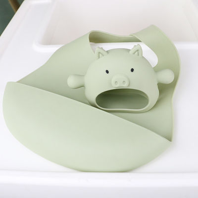 さまざまな設計の赤ん坊のための注文のさまざまな形のブタの形のハンドルのグリップのシリコーンTeether