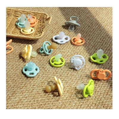 卸売 商品は色々な色で 配送は迅速 赤ちゃんにはBPAがなく 歯を磨く 落ち着く 柔らかいシリコン乳房